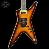 Electric guitar with a sunburst finish on a black background, featuring the Tone Shop logo.