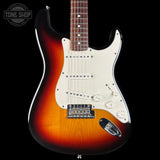 Electric guitar with a sunburst finish on a black background, featuring the Tone Shop logo.