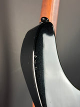 Close-up of a golf club head with a blurred background