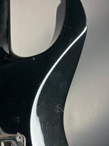 Close-up of a black metal object with reflective surface