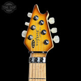 Guitar headstock with 'Evh Wolfgang Special' branding on a black background