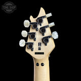 Guitar headstock with tuning pegs on a black background, featuring 'Tone Shop' logo.