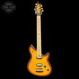 Electric guitar with a sunburst finish on a black background, featuring the Tone Shop logo.