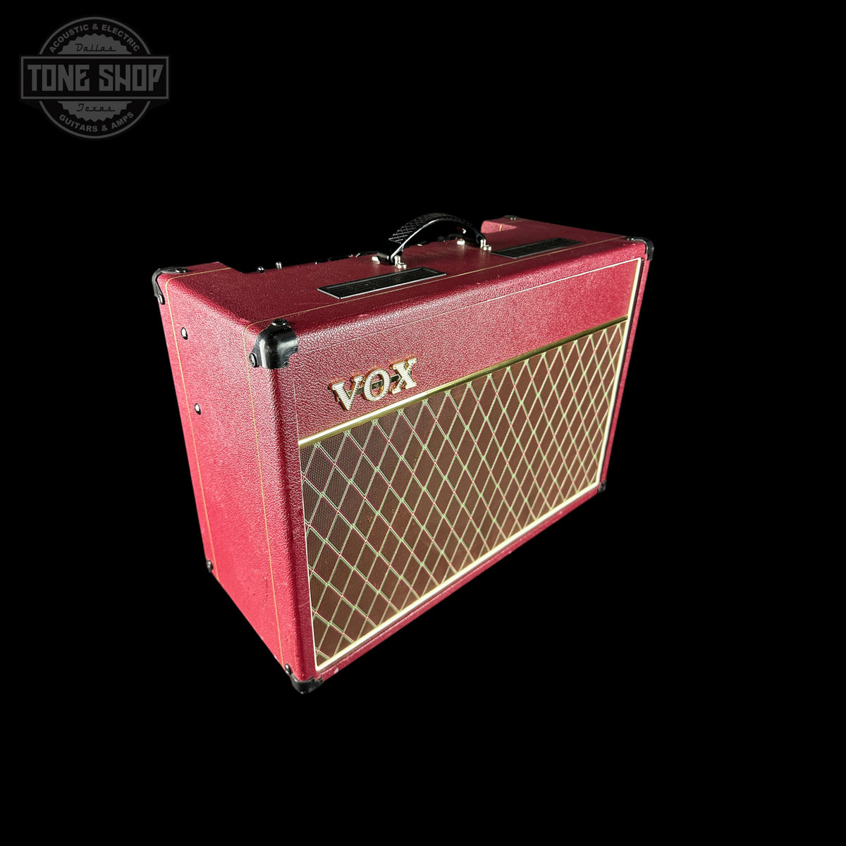 Red VOX guitar amplifier on a black background with 'Tone Shop' logo.