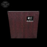 Maroon guitar amplifier cabinet with 'Tone Shop' logo in the corner