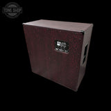 Guitar amplifier cabinet with brand logo on a black background