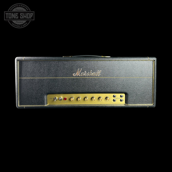 Marshall amplifier head with gold accents on a black background