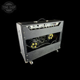 Guitar amplifier with 'Tone Shop' logo in the corner