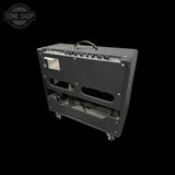 Guitar amplifier on a black background with 'Tone Shop' logo.