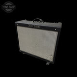 Fender Deluxe Reverb guitar amplifier on a black background with 'Tone Shop' logo.