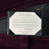 Certificate of Authenticity for a Martin Custom Shop guitar inside a dark case.