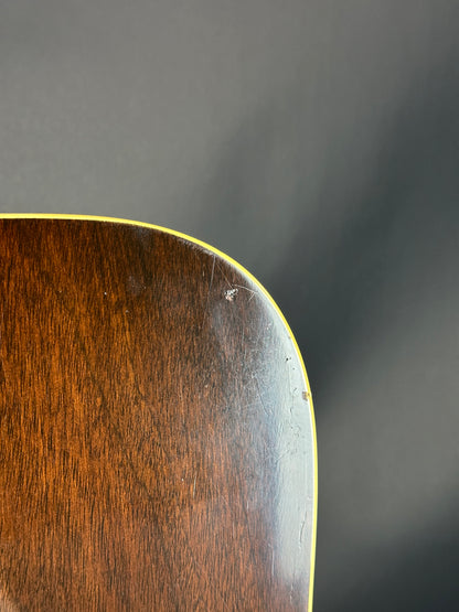 Close-up of a wooden surface with a dark gray background