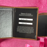 Gibson Custom Certificate of Authenticity inside a pink case