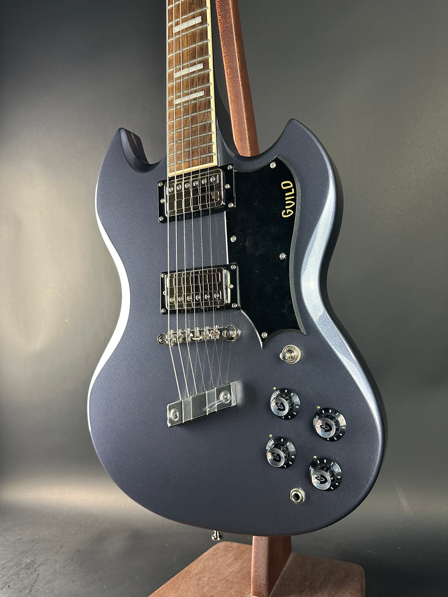 Guitar on a gray background