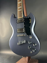 Guitar on a gray background