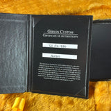 Gibson Custom Certificate of Authenticity on a textured surface