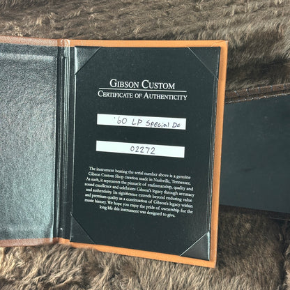 Gibson Custom Certificate of Authenticity on a textured surface