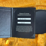 Gibson Custom Certificate of Authenticity on a textured surface