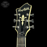 Guitar headstock with Hagstrom logo on a black background