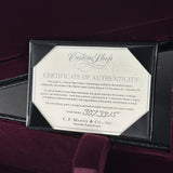 Certificate of Authenticity for a C.F. Martin guitar on a dark background