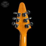 Guitar headstock with tuning pegs on a black background, featuring 'Tone Shop' logo.