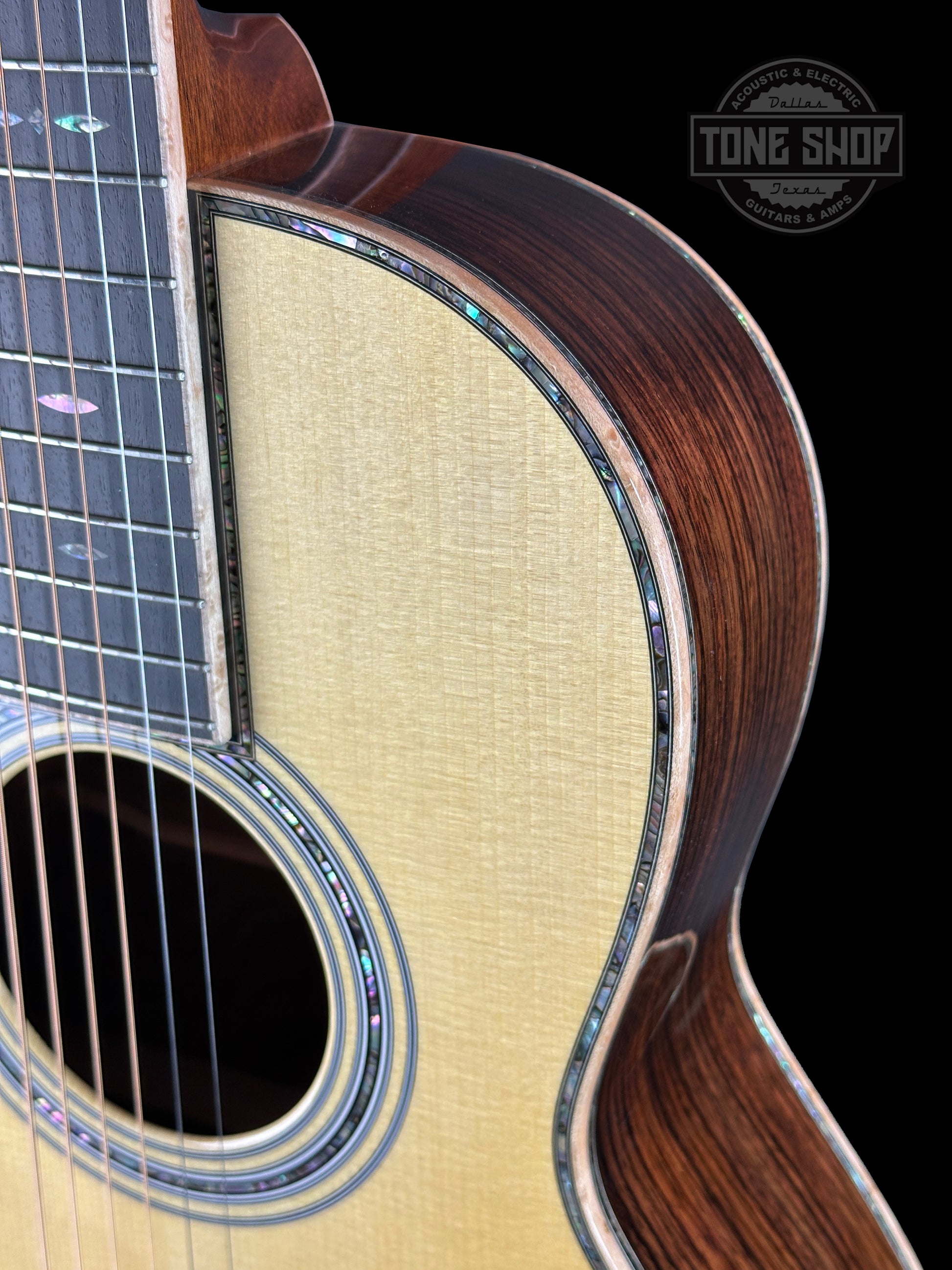 Front angle of Martin Custom Shop 00-12F 45 Style Adirondack/Wild Grain East Indian Rosewood.