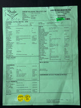 A light green paper shipping and inventory label for a 'Shop Floor Traveler' by Finder, showing product details, barcodes, and handwritten yellow price stickers near the bottom.