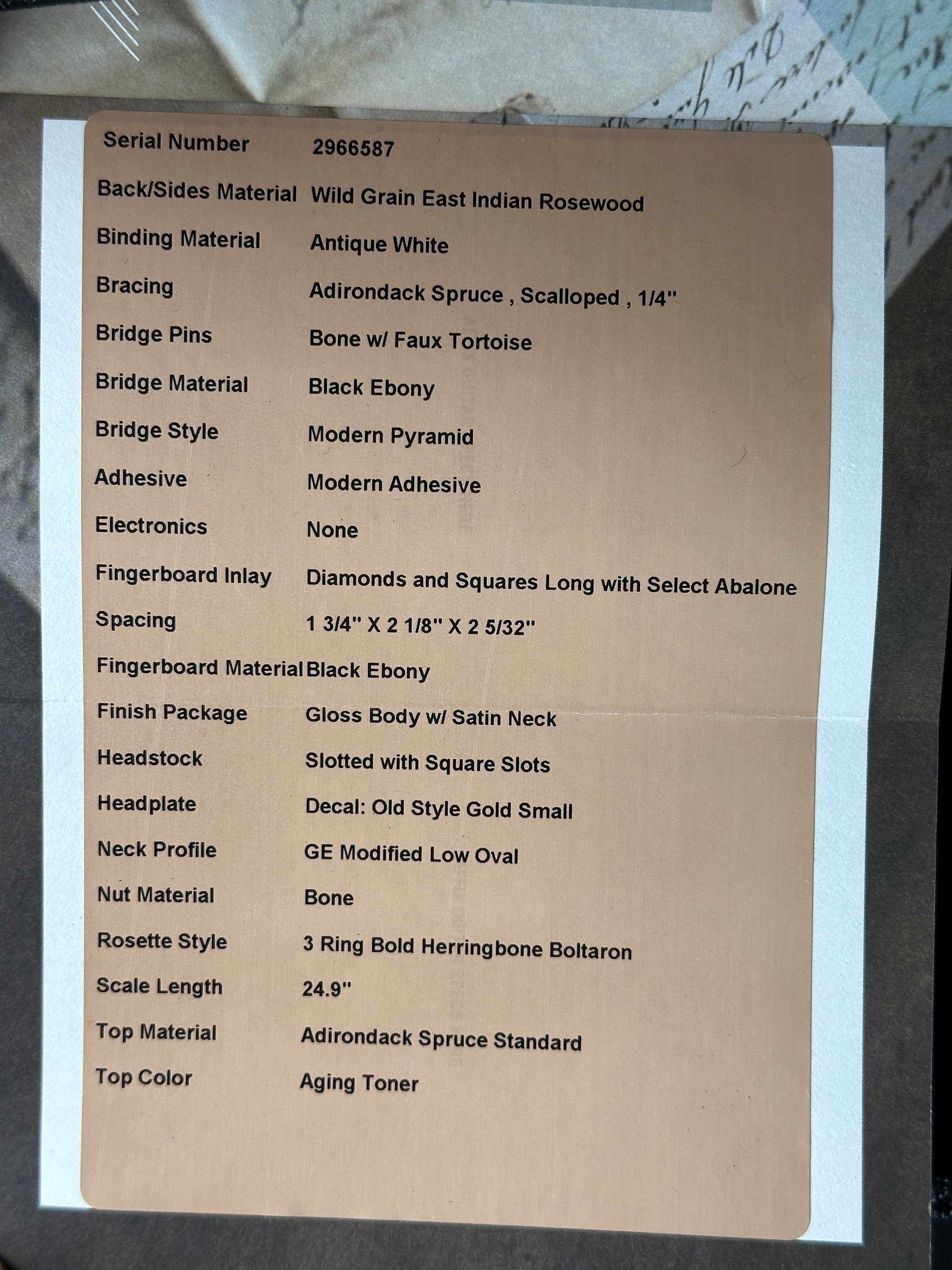 Spec sheet for Martin Custom Shop 00-12 Fret Wild Grain East Indian Rosewood.