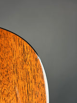 Close-up of a wooden surface with a gray background