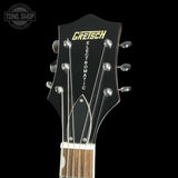 Gretsch Electromatic guitar headstock on a black background