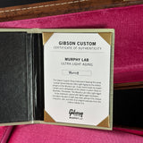 Gibson Custom Certificate of Authenticity for Murphy Lab Ultra Light Aging on a pink background