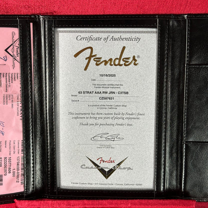 Fender certificate of authenticity in a black holder with a red background