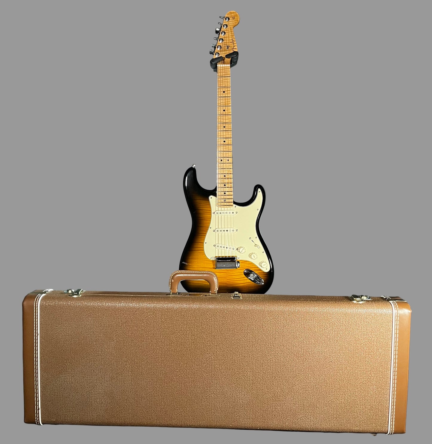 Front of w/case of Used Fender Custom Shop Stratocaster 1 of 1 Maple Top Sunburst w/Case TFW2549