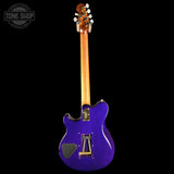 Purple electric guitar with a black background