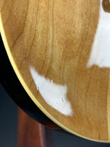 Close-up of a wooden surface with white residue