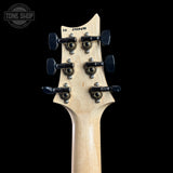 Close-up of a guitar headstock with six black tuning pegs and decorative gold-toned screws on a light natural wood neck, set against a solid black background.