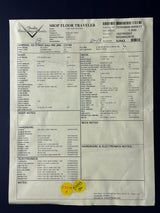 Document with text and a yellow label on a dark background