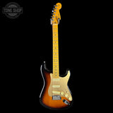 Electric guitar with a sunburst finish on a black background, featuring the Tone Shop logo.