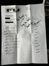 Packing slip with handwritten notes on a white background