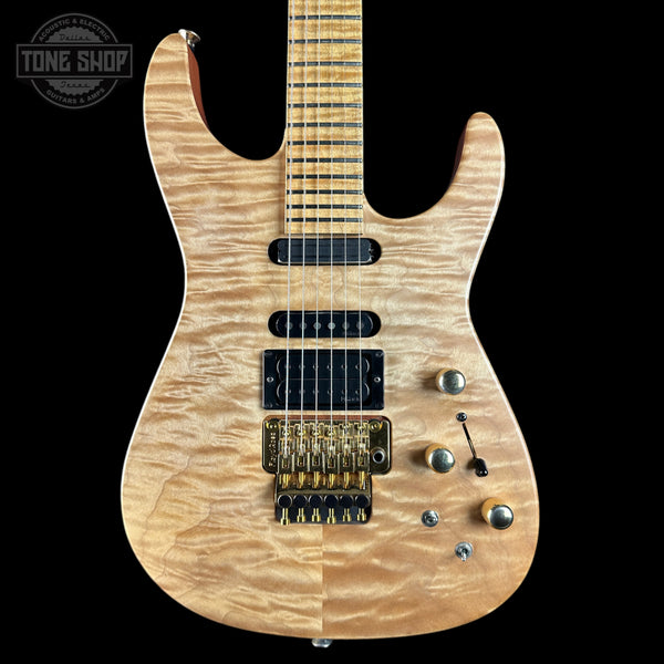 Wooden electric guitar with a black background