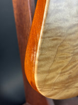 Close-up of a wooden surface with a dark background