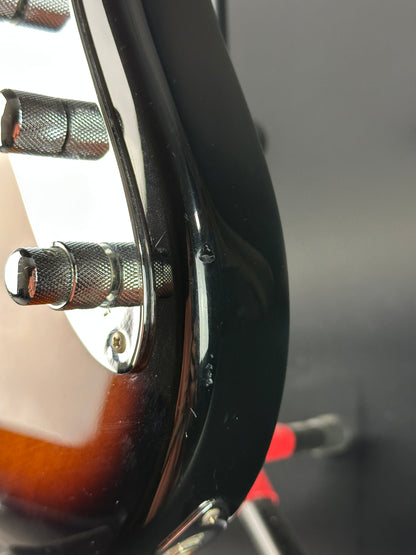Ding on side of Used Ken Smith Proto 5 String Sunburst.