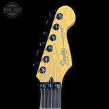 Fender guitar headstock on a black background with 'Tone Shop' logo.