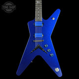 A blue sparkle electric guitar with a distinctive angular body, shown against a solid black background. The guitar features blue humbucker pickups, silver hardware, and a dark fretboard.