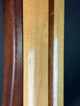 Close-up of wooden surface with a clear plastic strip