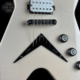 Close-up of a white glitter electric guitar body with a black V-shaped pickguard, dual humbucker pickups, and control knobs. The pickguard is engraved with the numbers 1776 and 2026.