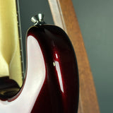 Chip on back of Used 2015 Fender American Standard RW Mystic Red.