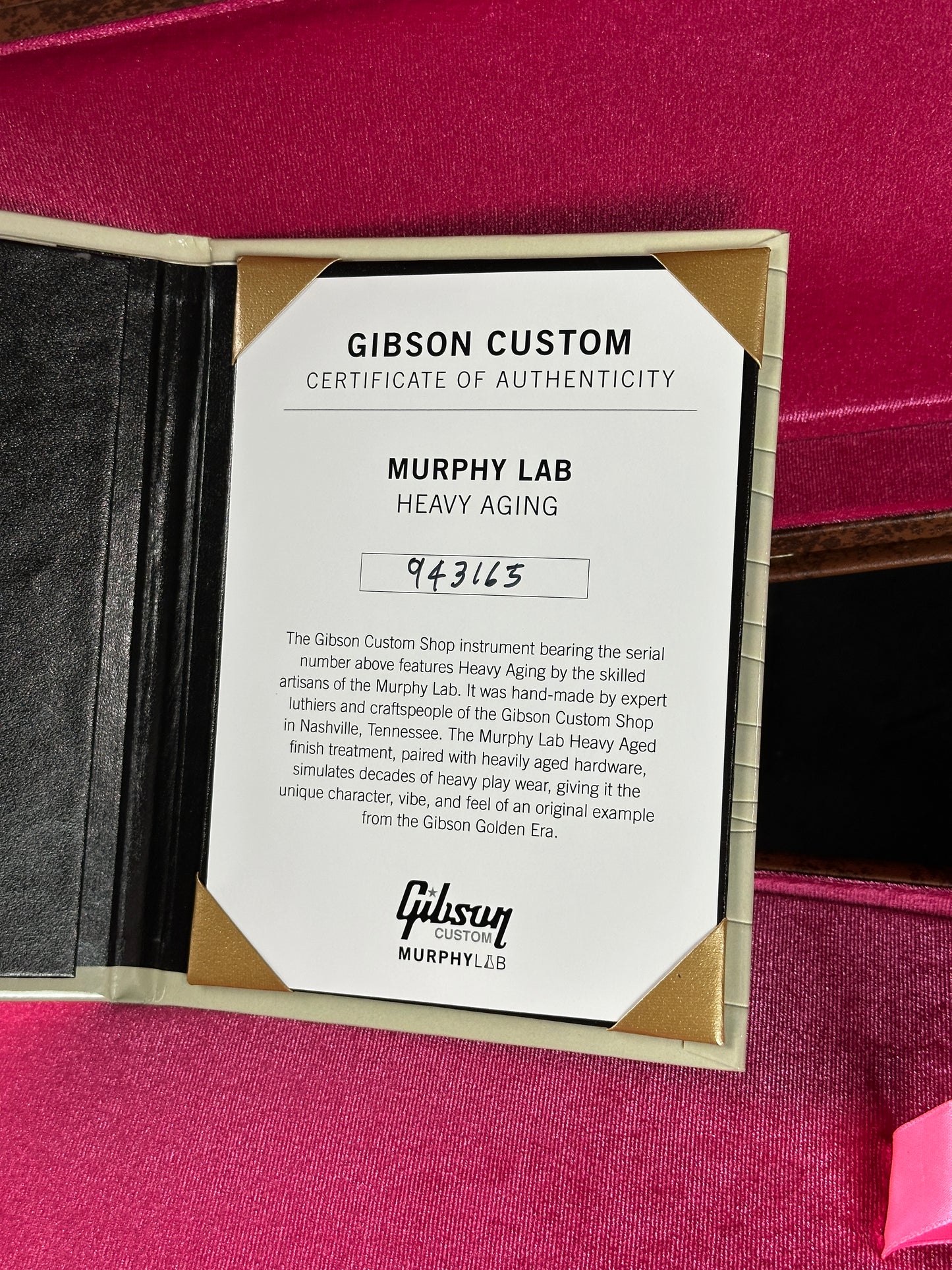 Gibson Custom Certificate of Authenticity on a pink background