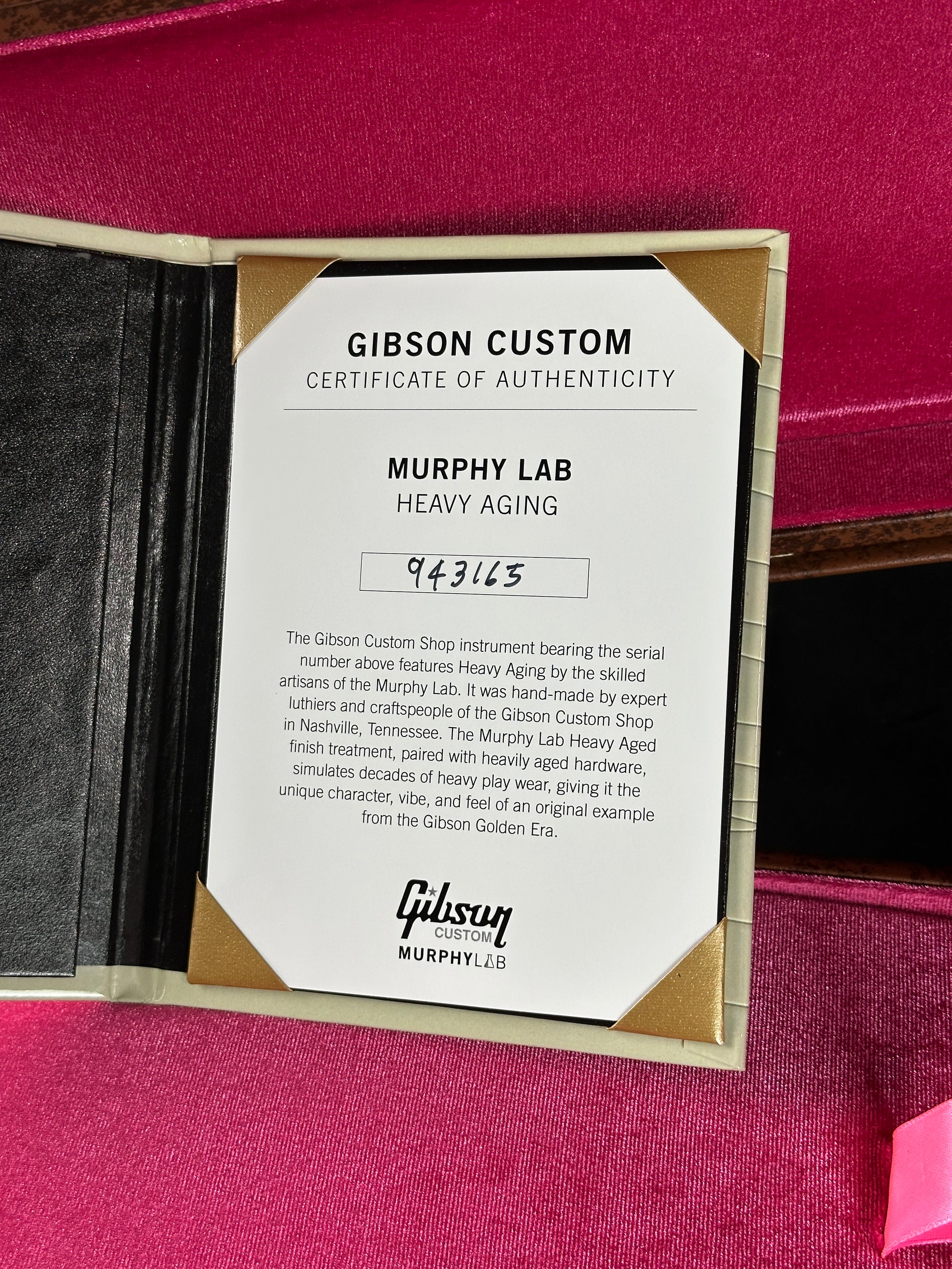 Gibson Custom Certificate of Authenticity on a pink background