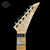 Guitar neck with 'Jackson' branding on a black background